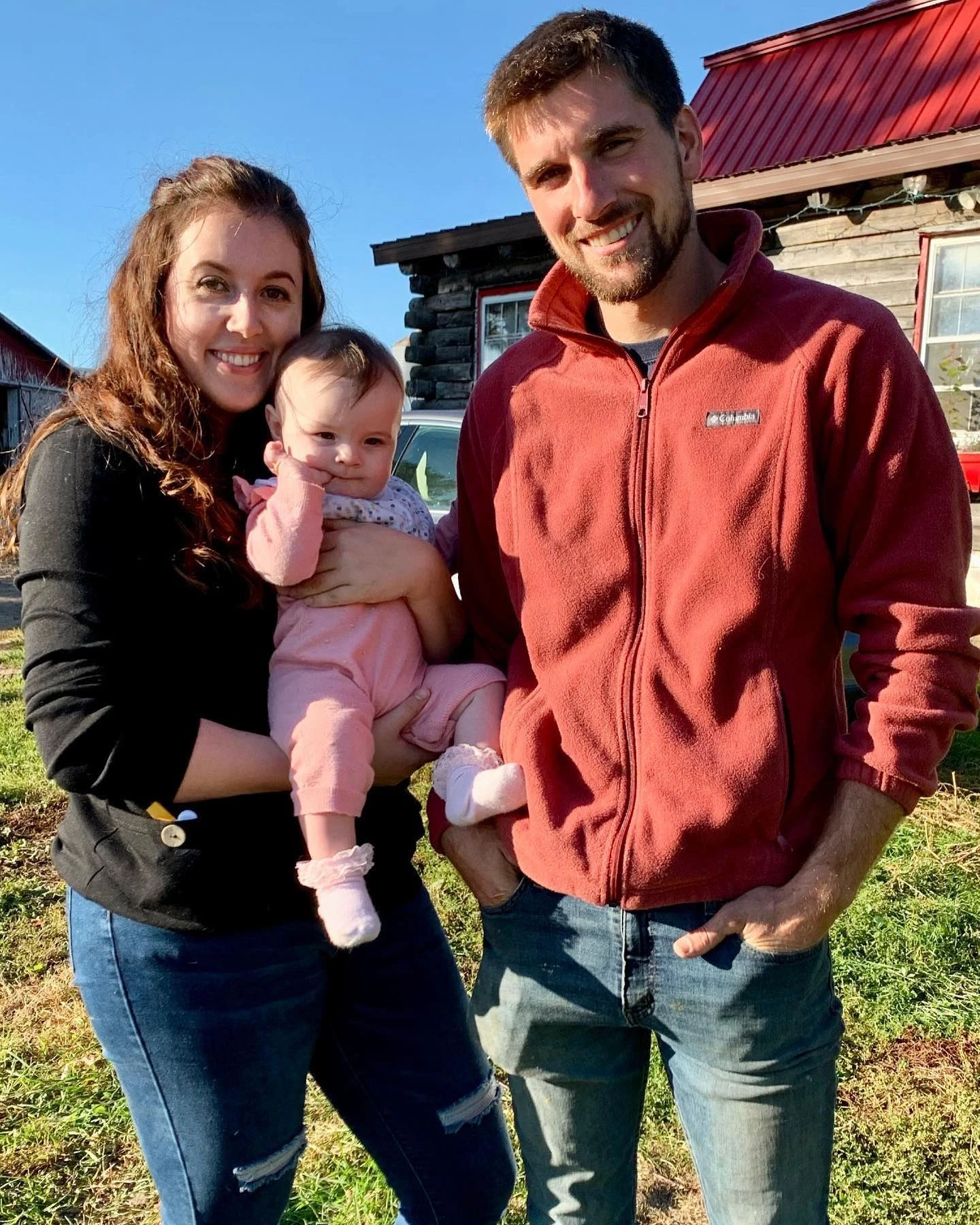 Michael and family by the barn