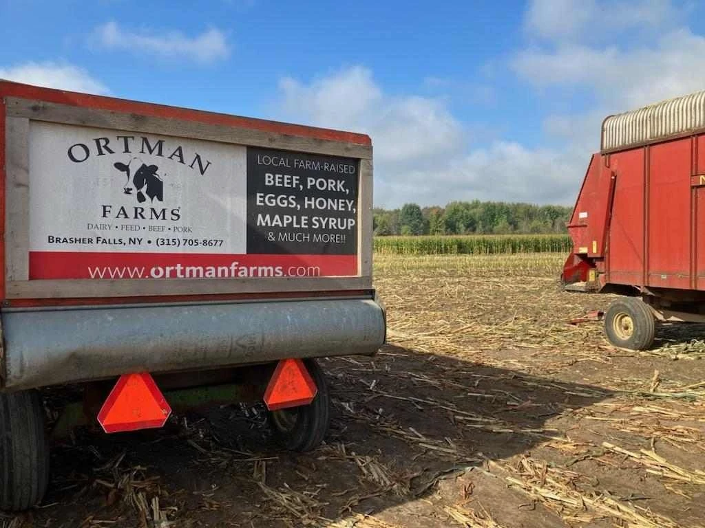 Ortman Farms sign in the cornfield