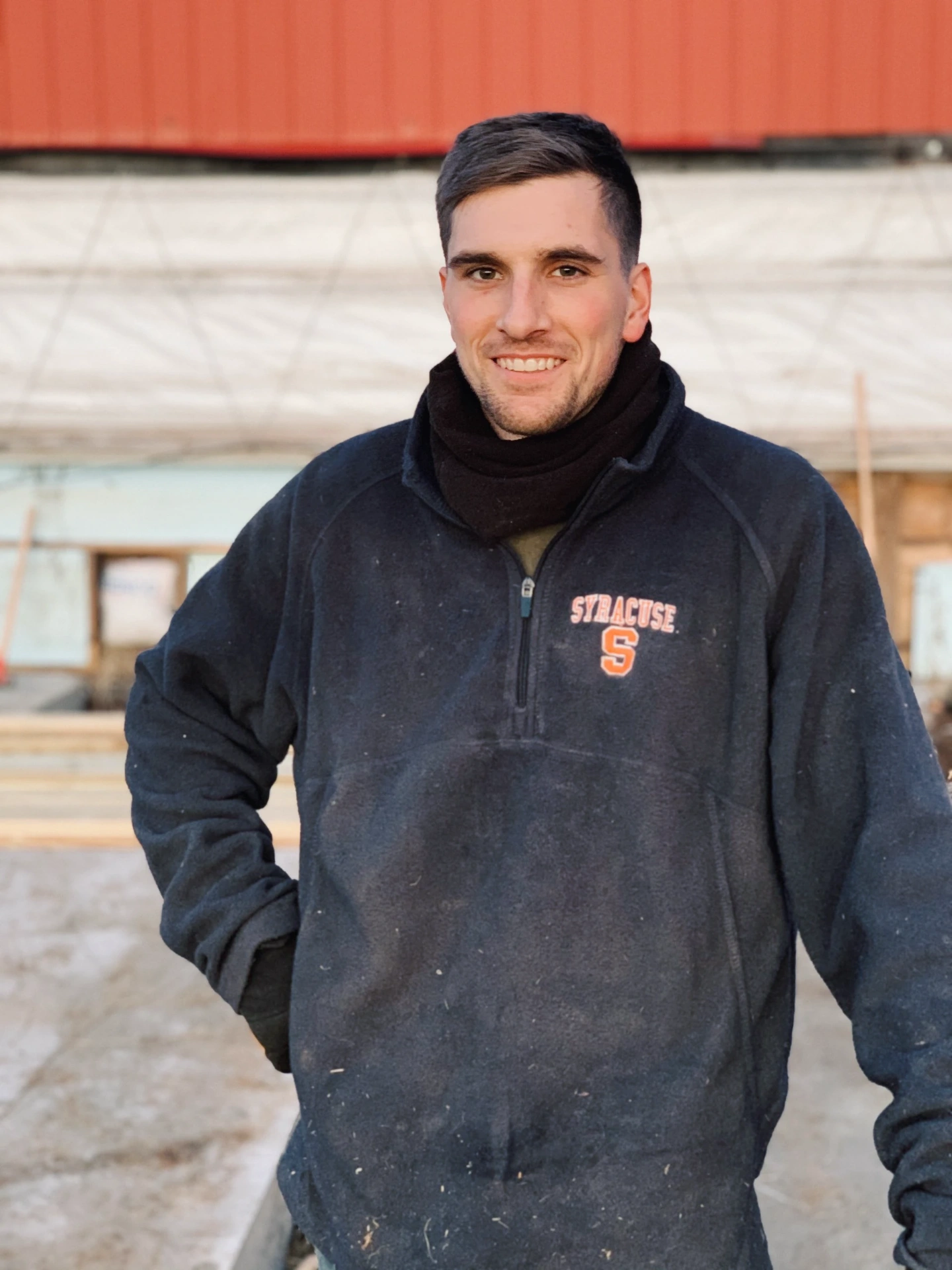 Michael Ortman by the barn