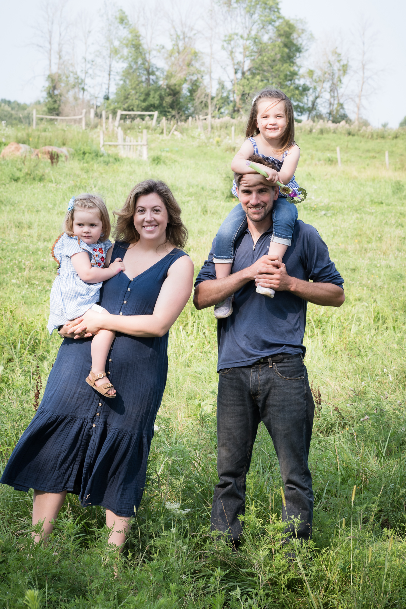 Ortman family portrait in the farm fields